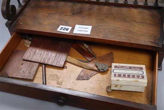 A Regency rosewood book rack, length 39cm